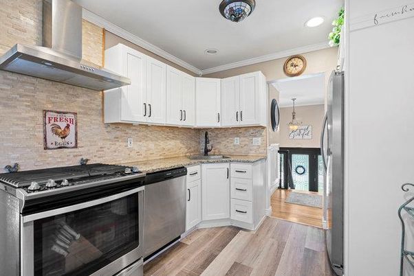 Interior, Kitchen, Pendant Lights, Recessed Lighting, Stainless Steel Appliances, Stone Walls, Wood Texture Flooring