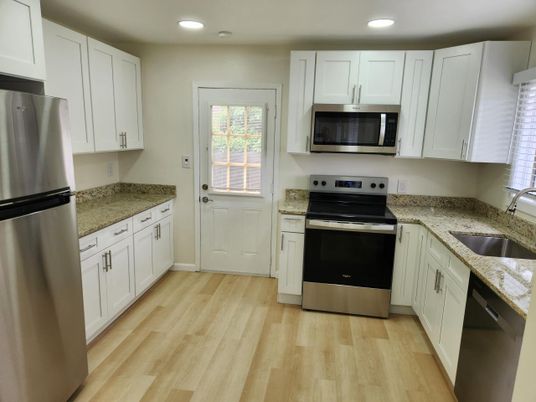 Interior, Kitchen, Recessed Lighting, Stainless Steel Appliances, Wood Texture Flooring