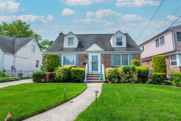 Exterior, Facade, Brick Facade, Cape Cod