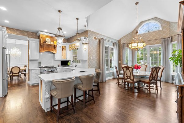 Chandelier, Dining room, Interior, Kitchen, Pendant Lights, Recessed Lighting, Stainless Steel Appliances, Wood Texture Flooring