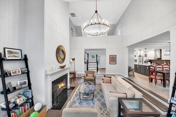 Chandelier, Dining room, Fireplace, Interior, Living room, Pendant Lights, Wood Texture Flooring