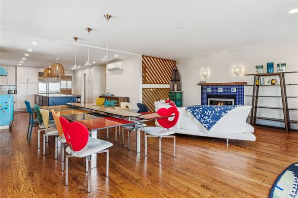 Dining room, Fireplace, Interior, Living room, Pendant Lights, Recessed Lighting, Wood Texture Flooring