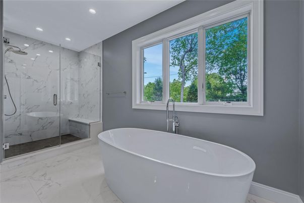 Bathroom, Free Standing Baths, Glass Shower, Interior, Marble, Marble Walls, Recessed Lighting