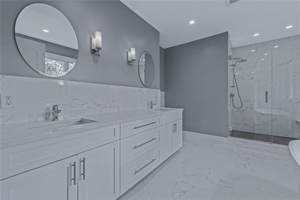Bathroom, Dual Sink Vanities, Glass Shower, Interior, Marble, Marble Walls, Recessed Lighting