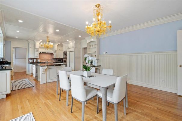 Chandelier, Dining room, Interior, Kitchen, Recessed Lighting, Stainless Steel Appliances, Wood Texture Flooring
