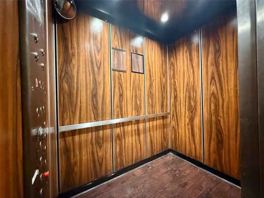 Elevator, Interior, Recessed Lighting, Wood Texture Flooring, Wooden Walls
