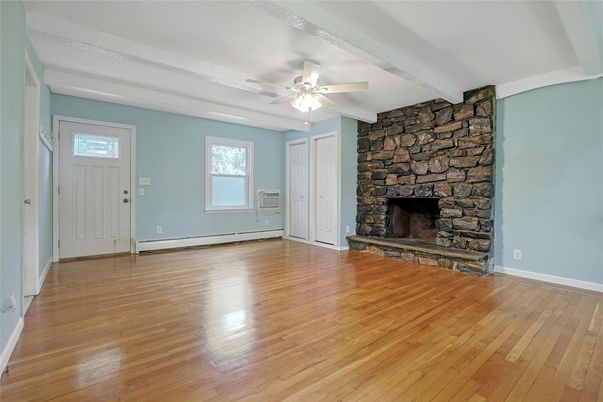 Empty room, Fireplace, Interior, Stone Walls, Wood Texture Flooring