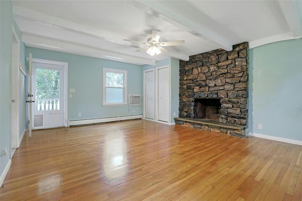 Empty room, Fireplace, Interior, Stone Walls, Wood Texture Flooring