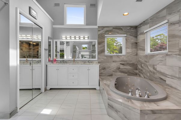 Bathroom, Dual Sink Vanities, Interior, Marble, Marble Walls, Recessed Lighting