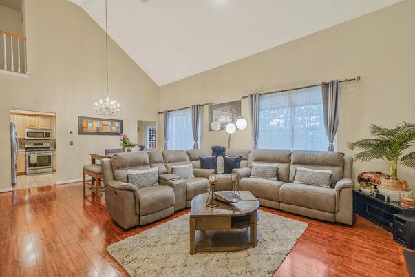 Chandelier, Dining room, Interior, Kitchen, Living room, Pendant Lights, Stainless Steel Appliances, Wood Texture Flooring