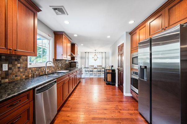 Dining room, Interior, Kitchen, Pendant Lights, Recessed Lighting, Stainless Steel Appliances, Wood Texture Flooring