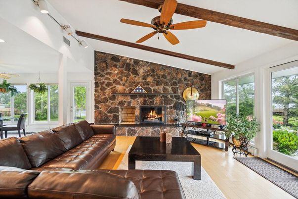 Fireplace, Interior, Living room, Recessed Lighting, Stone Walls, Wooden Beams, Wood Texture Flooring