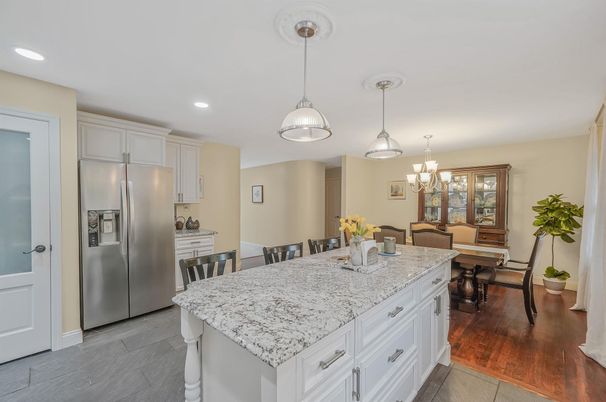 Chandelier, Dining room, Interior, Kitchen, Pendant Lights, Recessed Lighting, Stainless Steel Appliances, Wood Texture Flooring