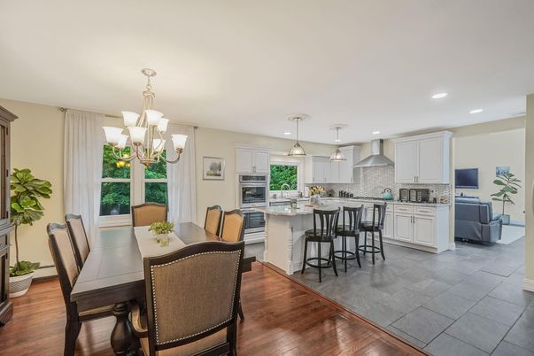 Chandelier, Dining room, Interior, Kitchen, Pendant Lights, Recessed Lighting, Stainless Steel Appliances, Wood Texture Flooring