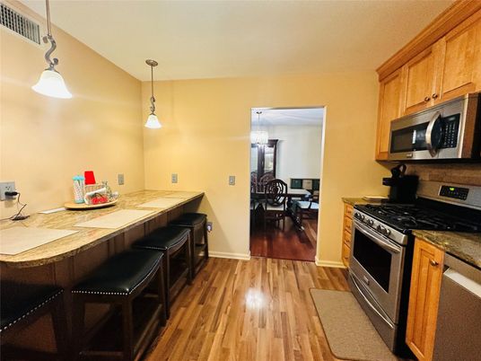 Dining room, Interior, Kitchen, Pendant Lights, Tile Countertops, Wood Texture Flooring