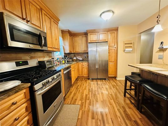 Interior, Kitchen, Pendant Lights, Stainless Steel Appliances, Wood Texture Flooring