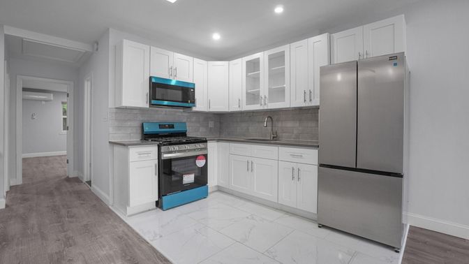 Interior, Kitchen, Marble, Recessed Lighting, Stainless Steel Appliances, Wood Texture Flooring