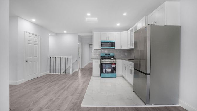 Interior, Kitchen, Marble, Recessed Lighting, Stainless Steel Appliances, Wood Texture Flooring