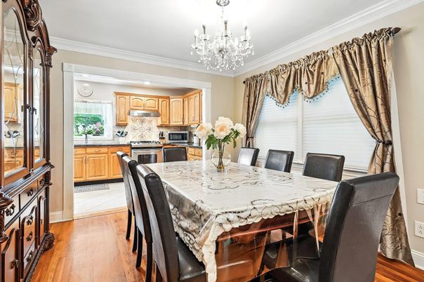 Chandelier, Dining room, Interior, Kitchen, Stainless Steel Appliances, Wood Texture Flooring