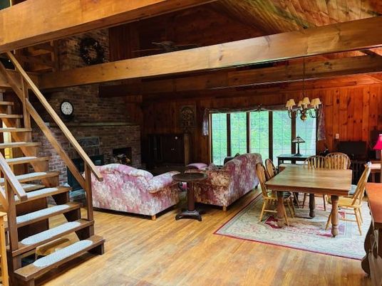 Chandelier, Dining room, Fireplace, Interior, Living room, Stone Walls, Wooden Beams, Wooden Ceilings, Wood Texture Flooring, Wooden Walls