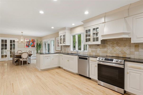 Chandelier, Dining room, Interior, Kitchen, Recessed Lighting, Stainless Steel Appliances, Wood Texture Flooring