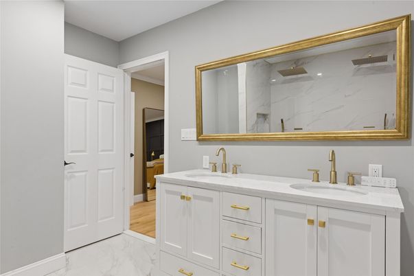Bathroom, Dual Sink Vanities, Interior, Marble, Marble Walls, Wood Texture Flooring