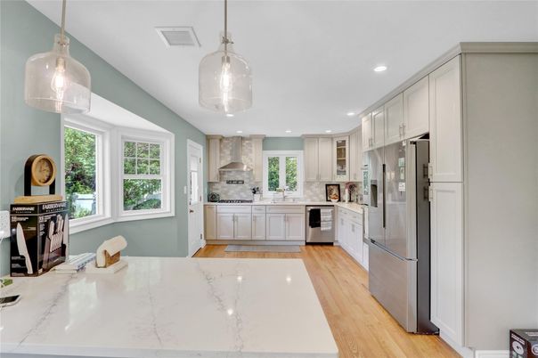 Interior, Kitchen, Pendant Lights, Recessed Lighting, Stainless Steel Appliances, Wood Texture Flooring