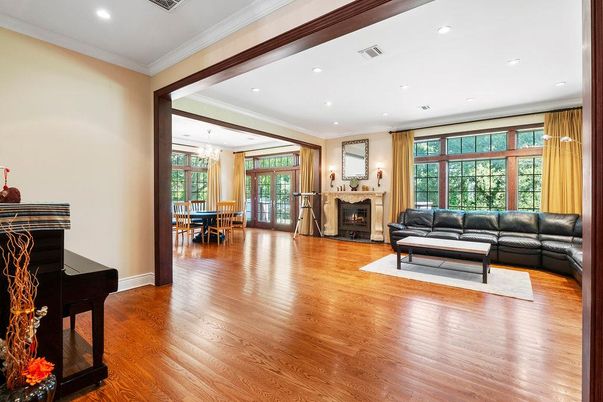 Chandelier, Dining room, Fireplace, Interior, Living room, Piano, Recessed Lighting, Wood Texture Flooring