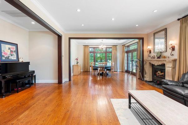 Chandelier, Dining room, Fireplace, Interior, Living room, Piano, Recessed Lighting, Wood Texture Flooring