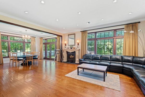 Chandelier, Dining room, Fireplace, Interior, Living room, Recessed Lighting, Wood Texture Flooring