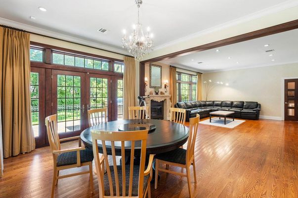 Chandelier, Dining room, Fireplace, Interior, Living room, Recessed Lighting, Wood Texture Flooring