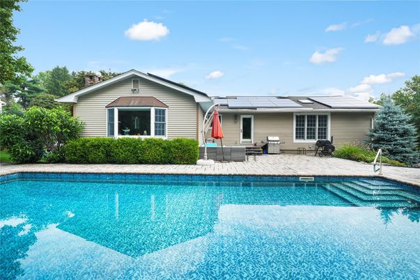 Exterior, Pool, Solar Panels