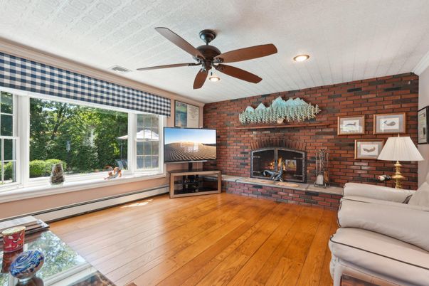 Fireplace, Interior, Recessed Lighting, Stone Walls, Wood Texture Flooring