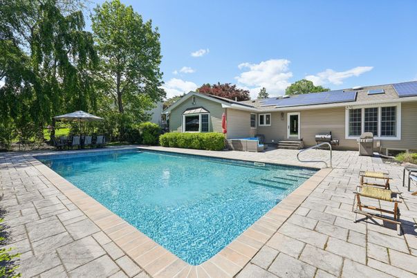 Exterior, Pool, Solar Panels