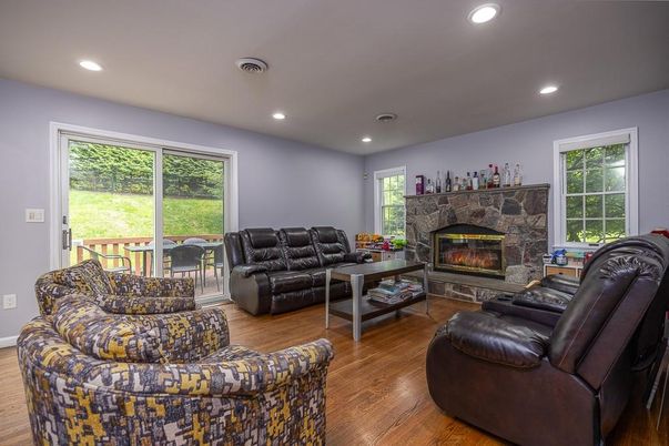 Fireplace, Interior, Living room, Recessed Lighting, Wood Texture Flooring