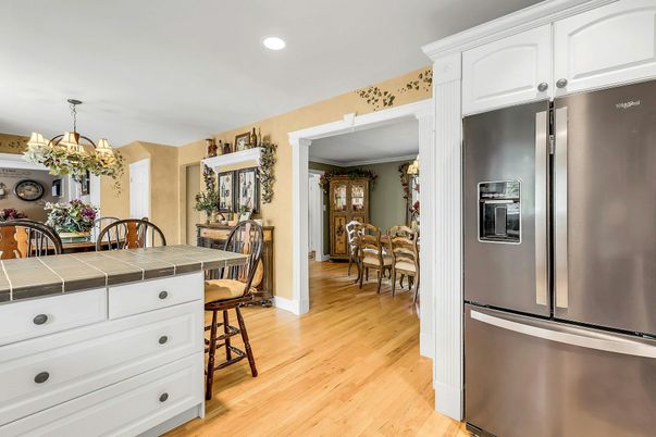 Chandelier, Dining room, Interior, Kitchen, Recessed Lighting, Tile Countertops, Wood Texture Flooring