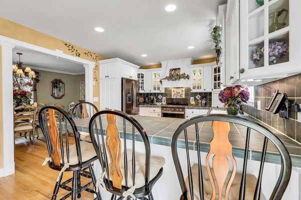Chandelier, Dining room, Interior, Kitchen, Recessed Lighting, Stainless Steel Appliances, Wood Texture Flooring