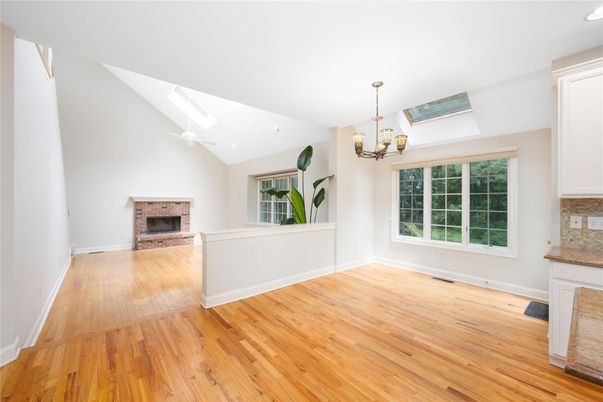 Chandelier, Empty room, Fireplace, Interior, Recessed Lighting, Wood Texture Flooring
