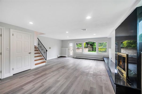 Empty room, Fireplace, Interior, Recessed Lighting, Wood Texture Flooring