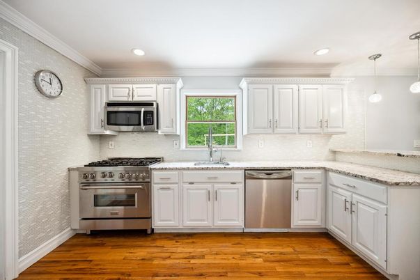 Interior, Kitchen, Pendant Lights, Recessed Lighting, Stainless Steel Appliances, Wood Texture Flooring