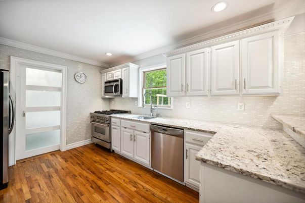 Interior, Kitchen, Recessed Lighting, Stainless Steel Appliances, Wood Texture Flooring