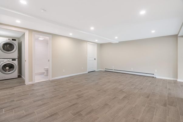 Empty room, Interior, Recessed Lighting, Utility Closets, Washer, Wood Texture Flooring