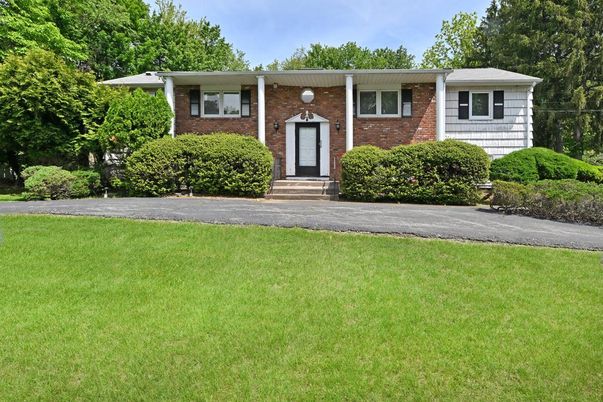 Exterior, Facade, Brick Facade, Raised Ranch