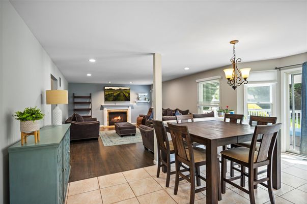 Dining room, Fireplace, Interior, Living room, Pendant Lights, Recessed Lighting, Wood Texture Flooring