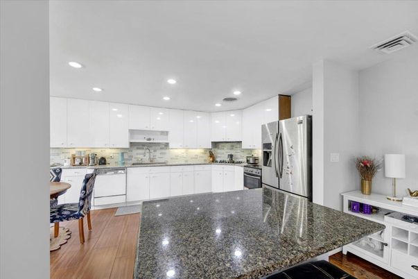 Dining room, Interior, Kitchen, Recessed Lighting, Stainless Steel Appliances, Wood Texture Flooring