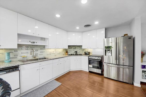 Interior, Kitchen, Recessed Lighting, Stainless Steel Appliances, Wood Texture Flooring