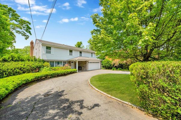 Attached, Backyard, Exterior, Facade, Brick Facade, Raised Ranch