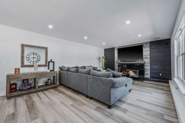Fireplace, Interior, Living room, Recessed Lighting, Wood Texture Flooring