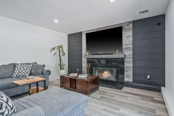 Fireplace, Interior, Living room, Recessed Lighting, Wood Texture Flooring
