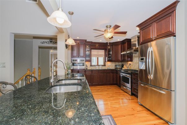 Interior, Kitchen, Pendant Lights, Recessed Lighting, Stainless Steel Appliances, Wood Texture Flooring